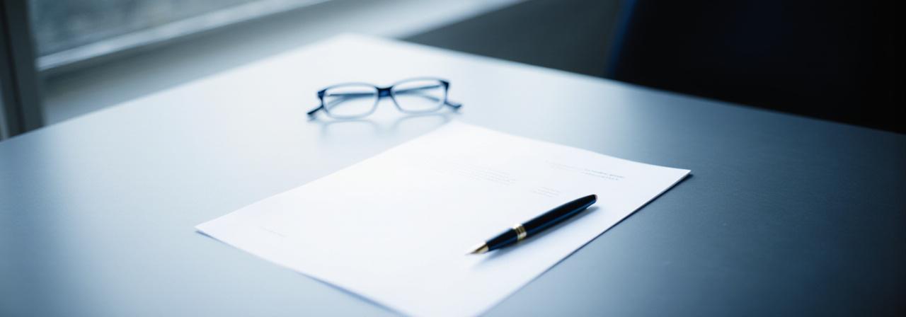 Professional documentation and legal paperwork on a corporate desk